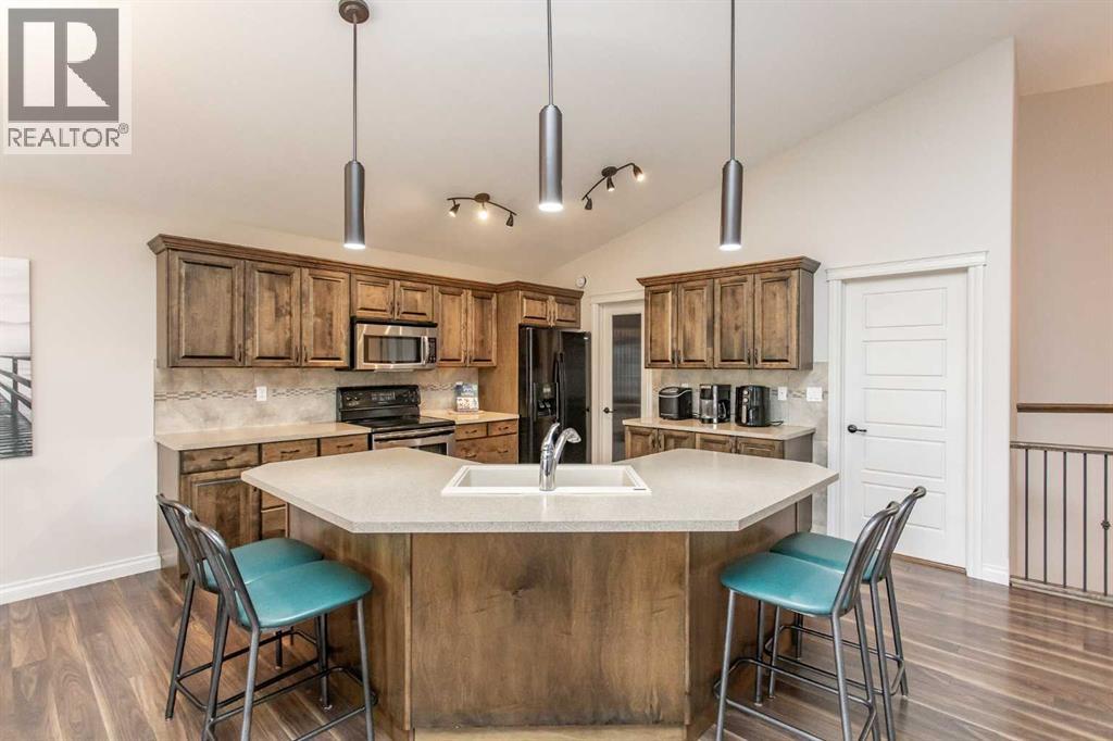 Kitchen with tons of cabinets and countertops