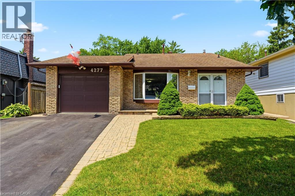Bungalow-style residence featuring a brick facade and an attached single-car garage