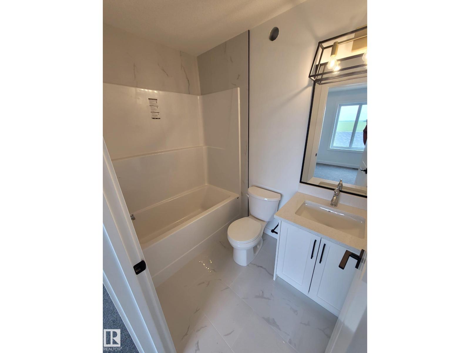 Mainfloor 9802 107 Morinville Avenue - Photo 10