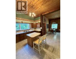 Enclosed porch - 110 Deer Cres, Mcphee Lake, SK S0J0N0 Photo 6
