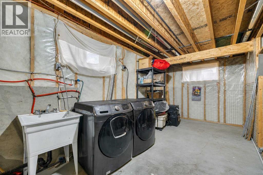 Basement Laundry Area with Wash Basin (hookups also on main floor)