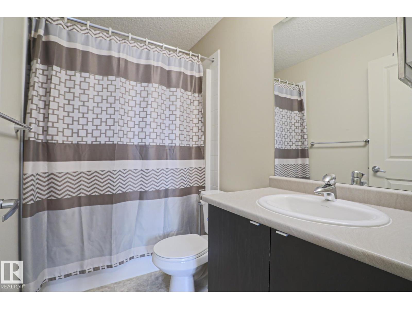#411 3353 16A AV NW - 10