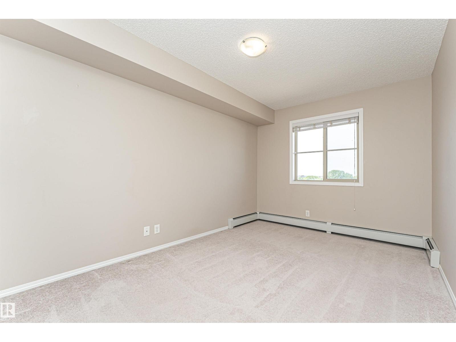 #404 12045 22 AV SW — photo 24