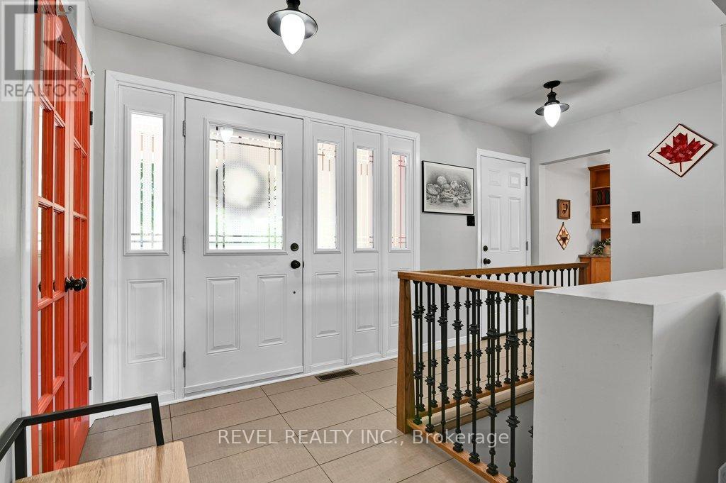 Foyer with inside entry to garage