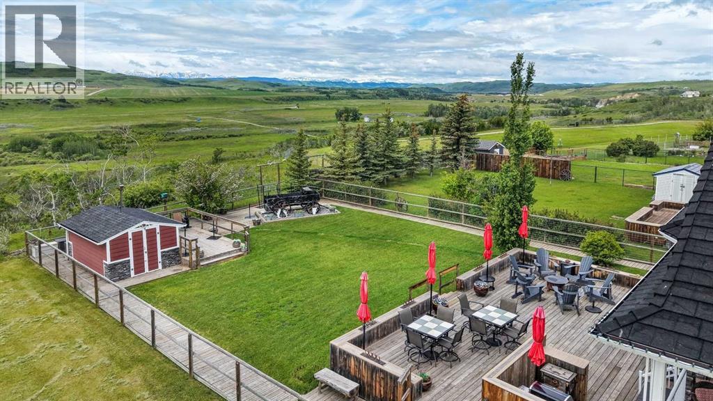 Landscaped to perfection! So many outdoor spaces for family and friends to enjoy.  Two storage sheds to tuck everything away