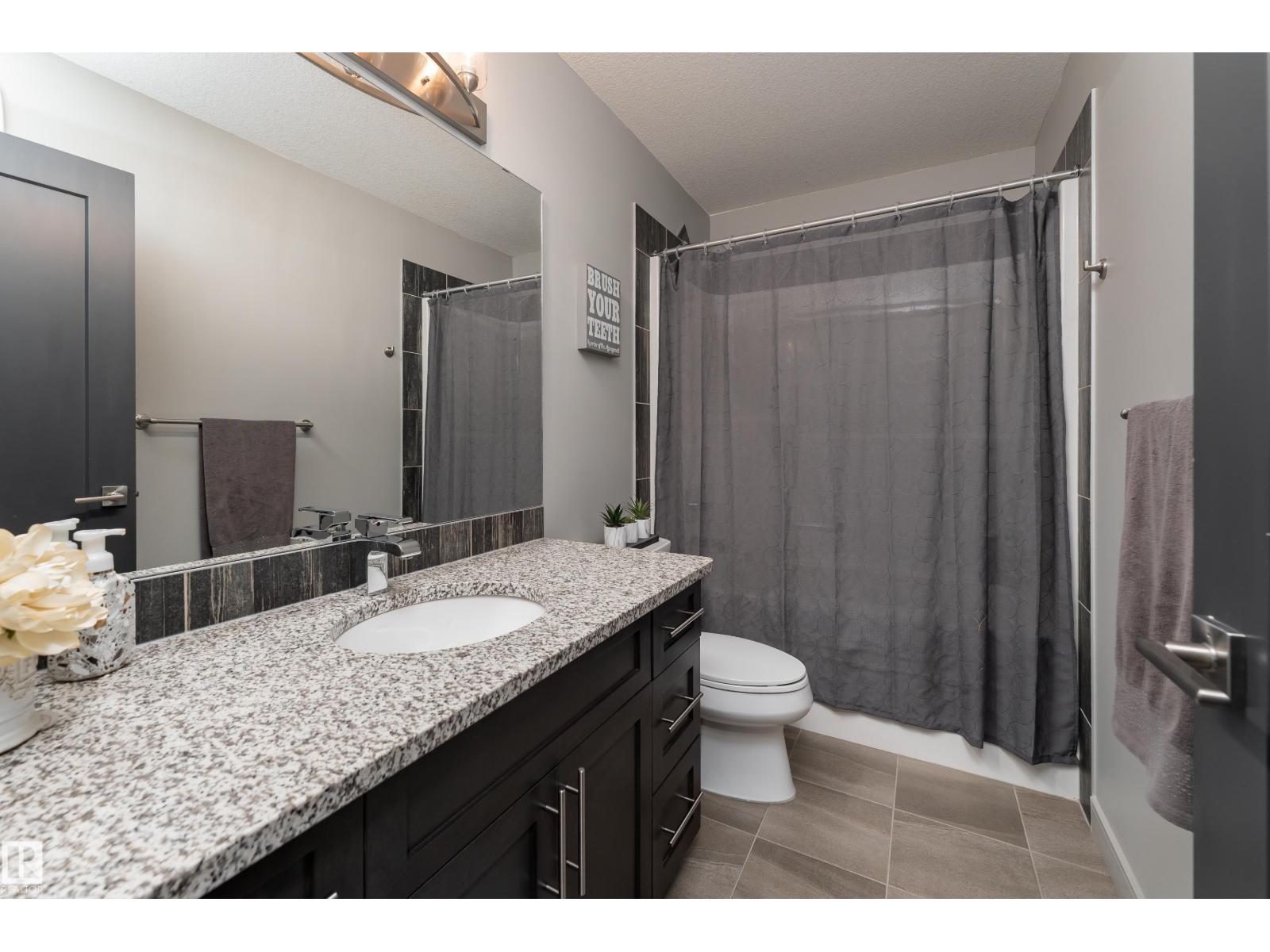 7038 172A AV NW - 32
