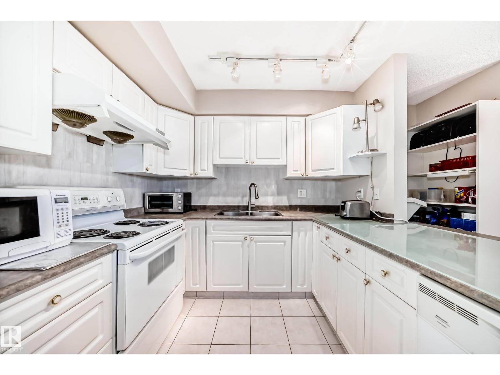 #406 10909 103 AV NW - 8
