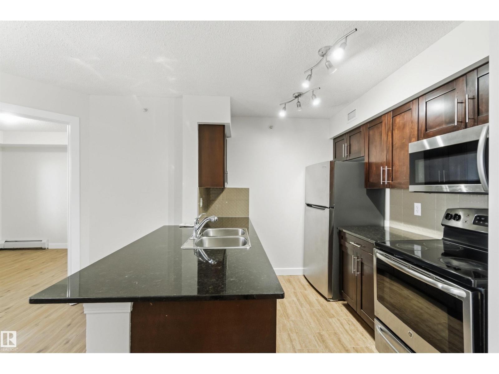 #403 270 MCCONACHIE DR NW — photo 7