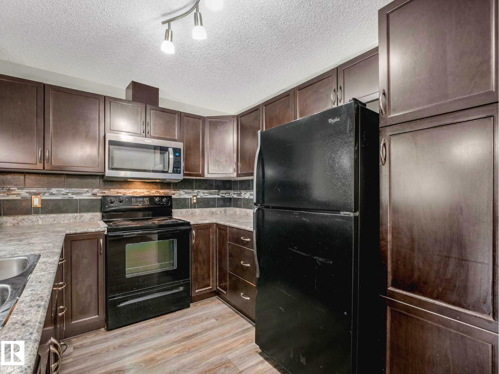 #117 6070 SCHONSEE WY NW — photo 16