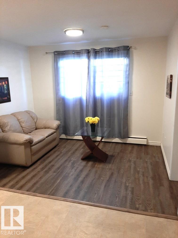 #104 12409 82 ST NW - 23