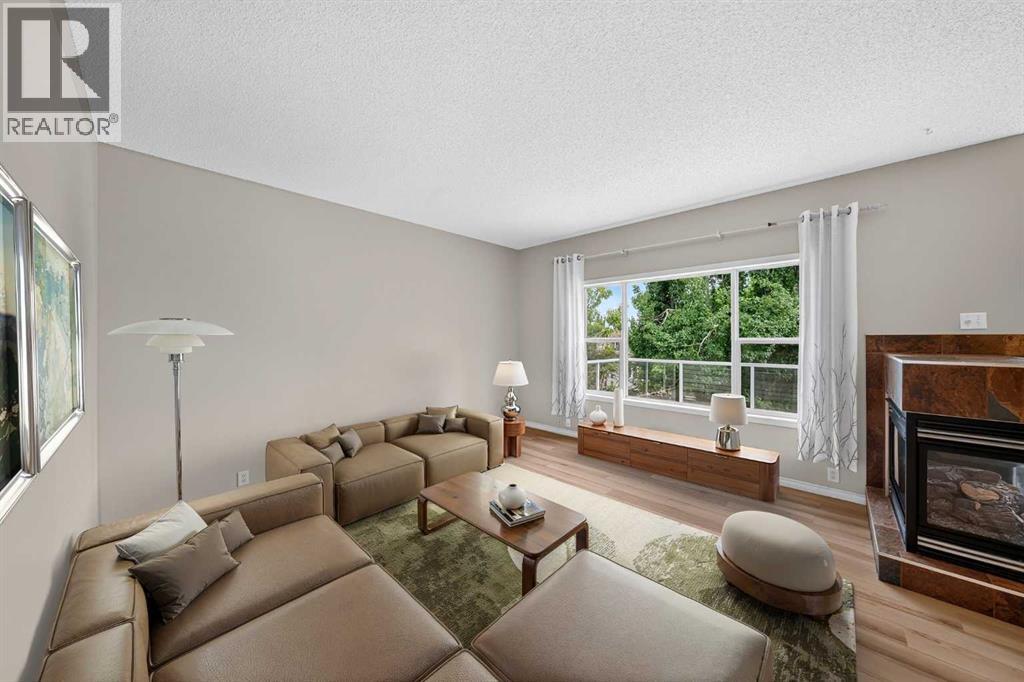 bright and sunny living room with 3-sided fireplace