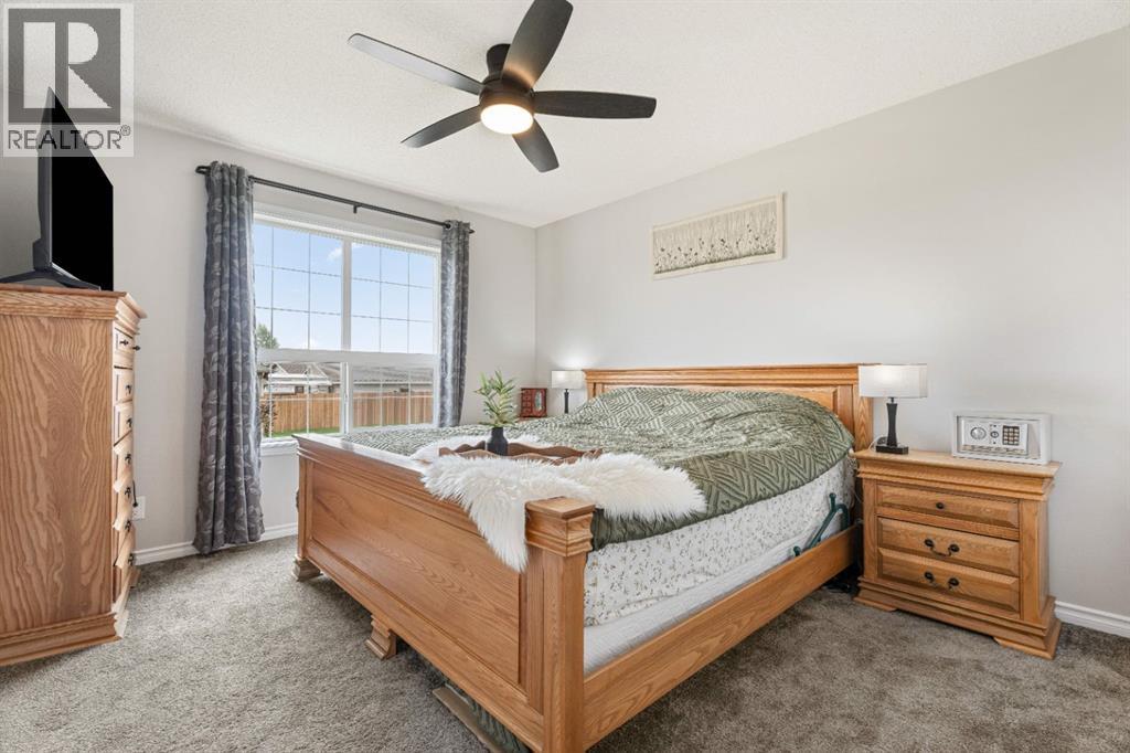 Primary Bedroom with updated ceiling fan