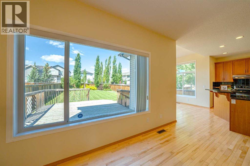 View of deck and spacious backyard