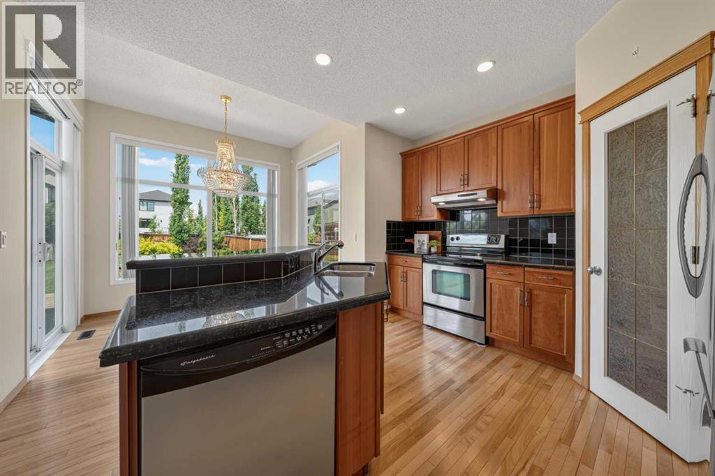 Stainless steel appliances and corner pantry