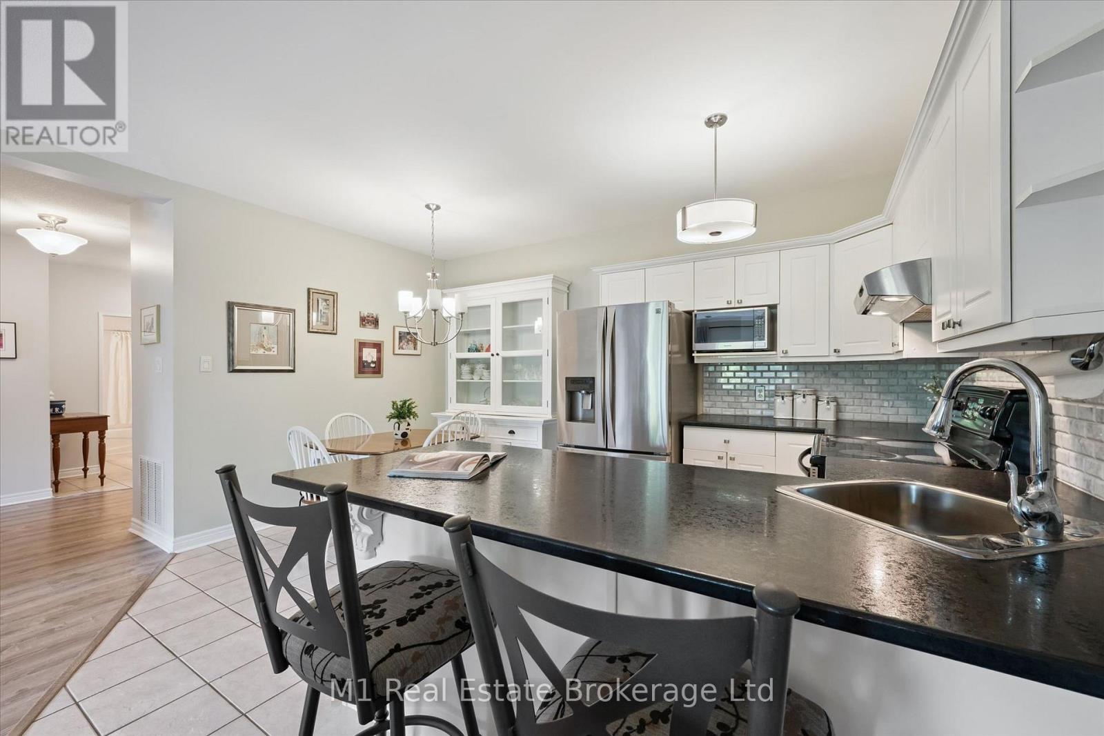 #207 60 WYNDHAM STREET S - 25