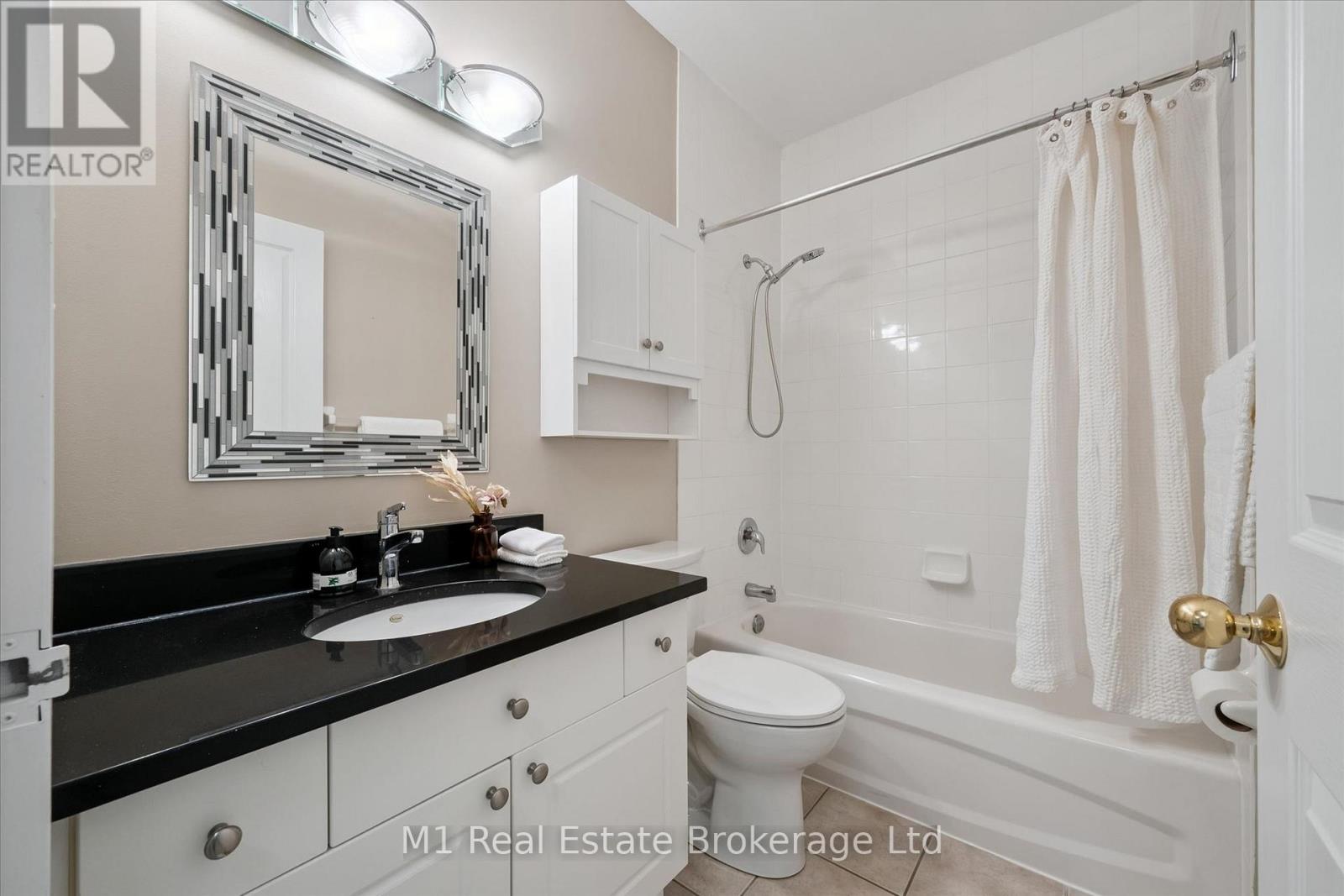 #207 60 WYNDHAM STREET S - 33