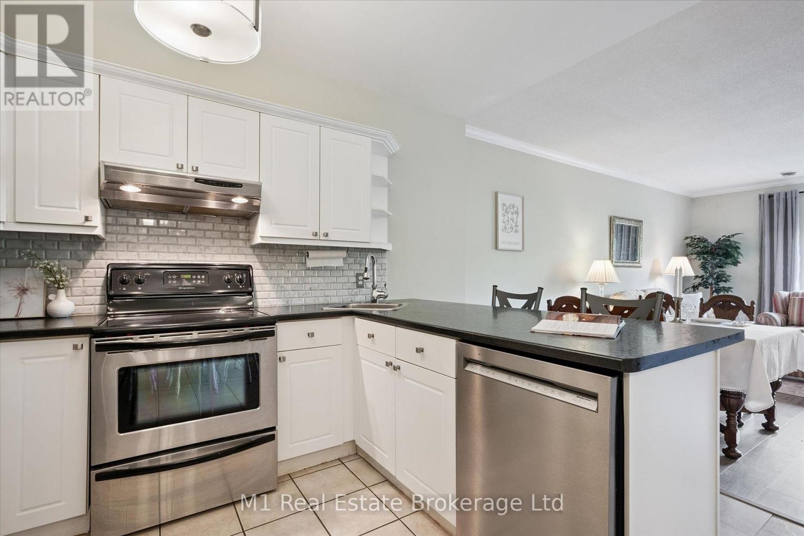 #207 60 WYNDHAM STREET S - 23