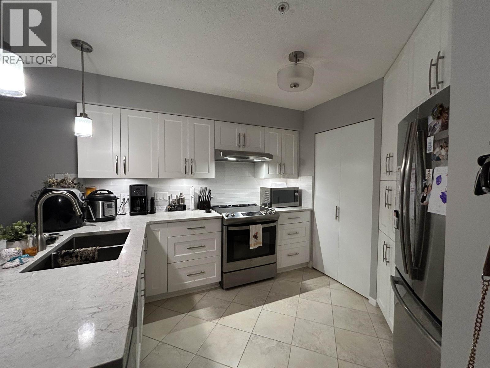209 19677 MEADOW GARDENS WAY, Pitt Meadows
