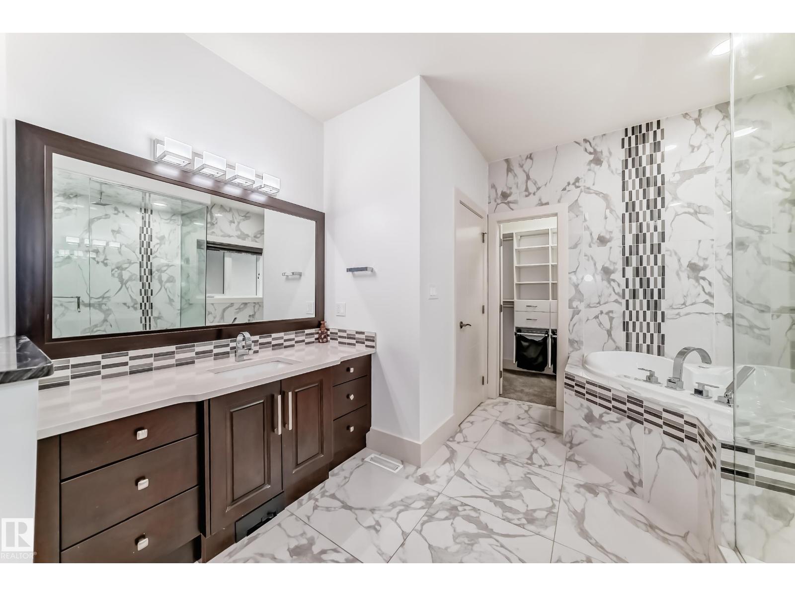 5511 MCLUHAN BLUFF BL NW - 33