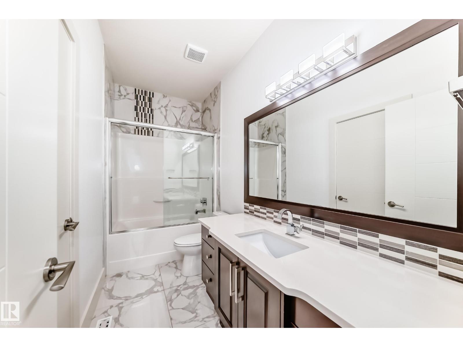 5511 MCLUHAN BLUFF BL NW - 40