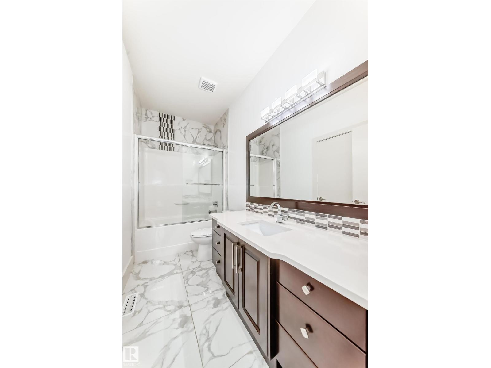 5511 MCLUHAN BLUFF BL NW - 41