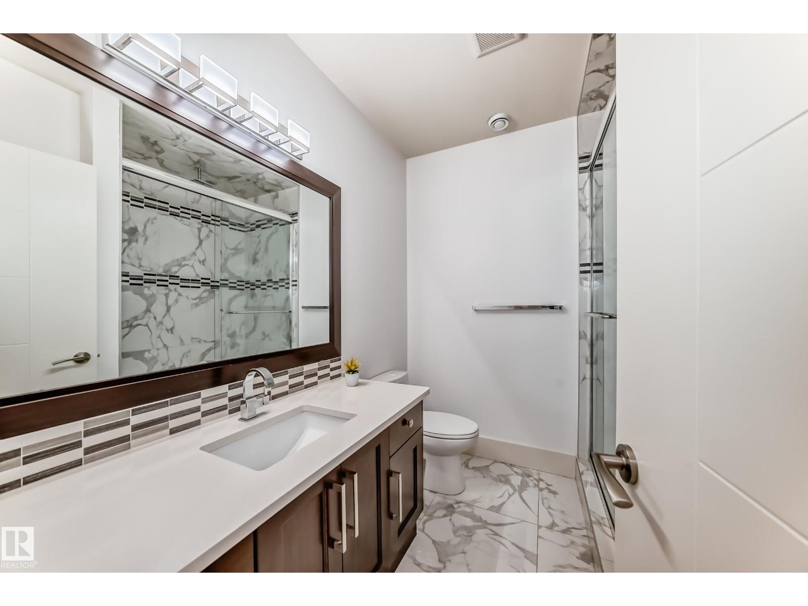 5511 MCLUHAN BLUFF BL NW - 61