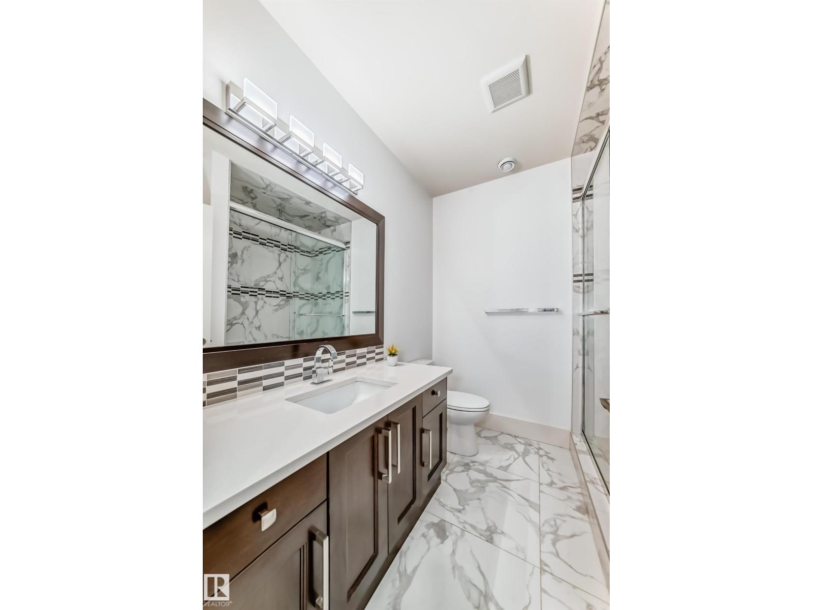 5511 MCLUHAN BLUFF BL NW - 62