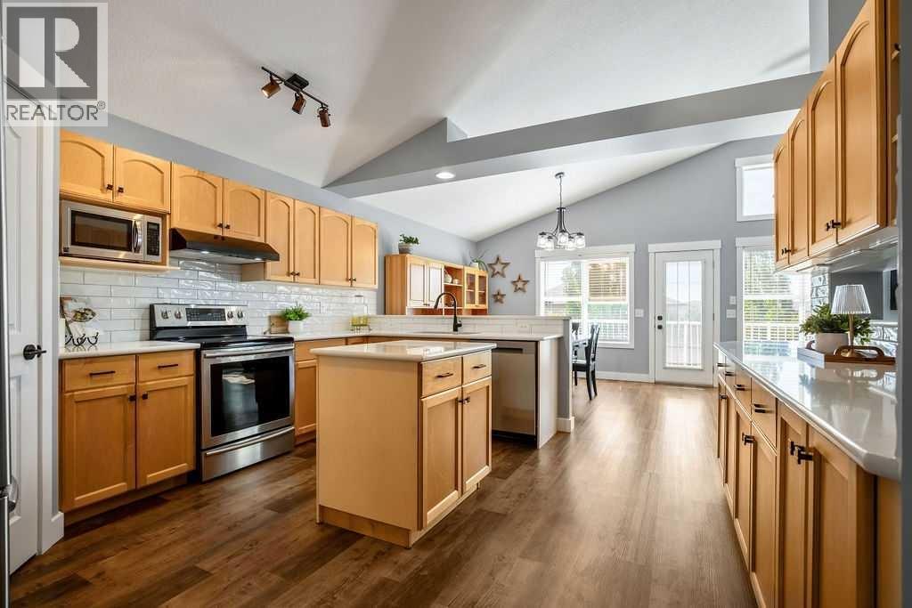 There is no shortage of cabinet space in this kitchen.  The central island is a great workspace