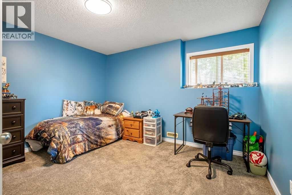 Bedroom 1, lower level with large window