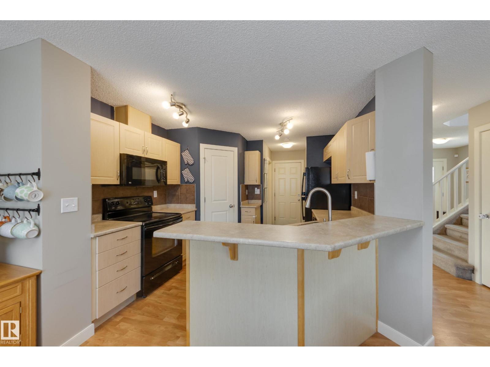 9456 STEIN WY NW - 9