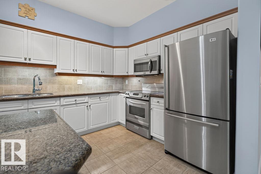 #106 1406 HODGSON WY NW — photo 13