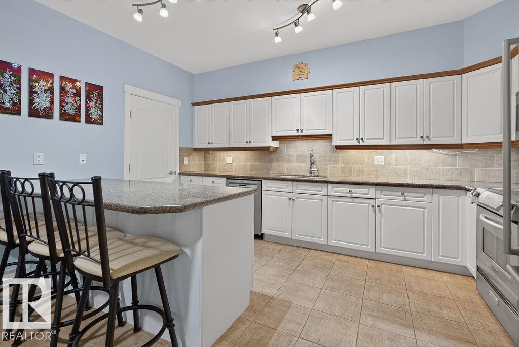 #106 1406 HODGSON WY NW — photo 14