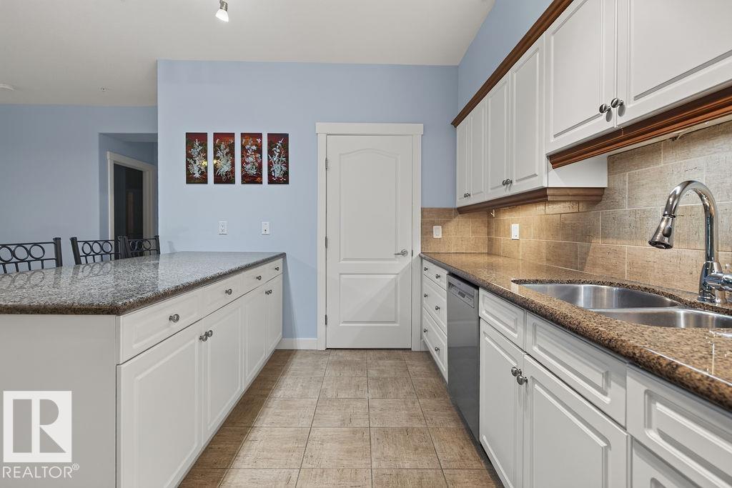 #106 1406 HODGSON WY NW — photo 15