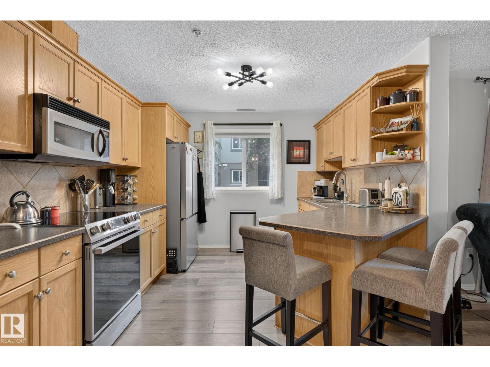 #122 279 SUDER GREENS DR NW — photo 10