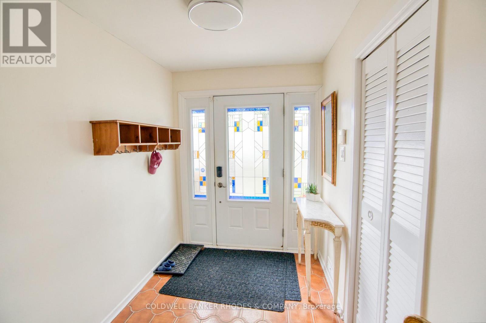 Welcoming foyer with closet space.