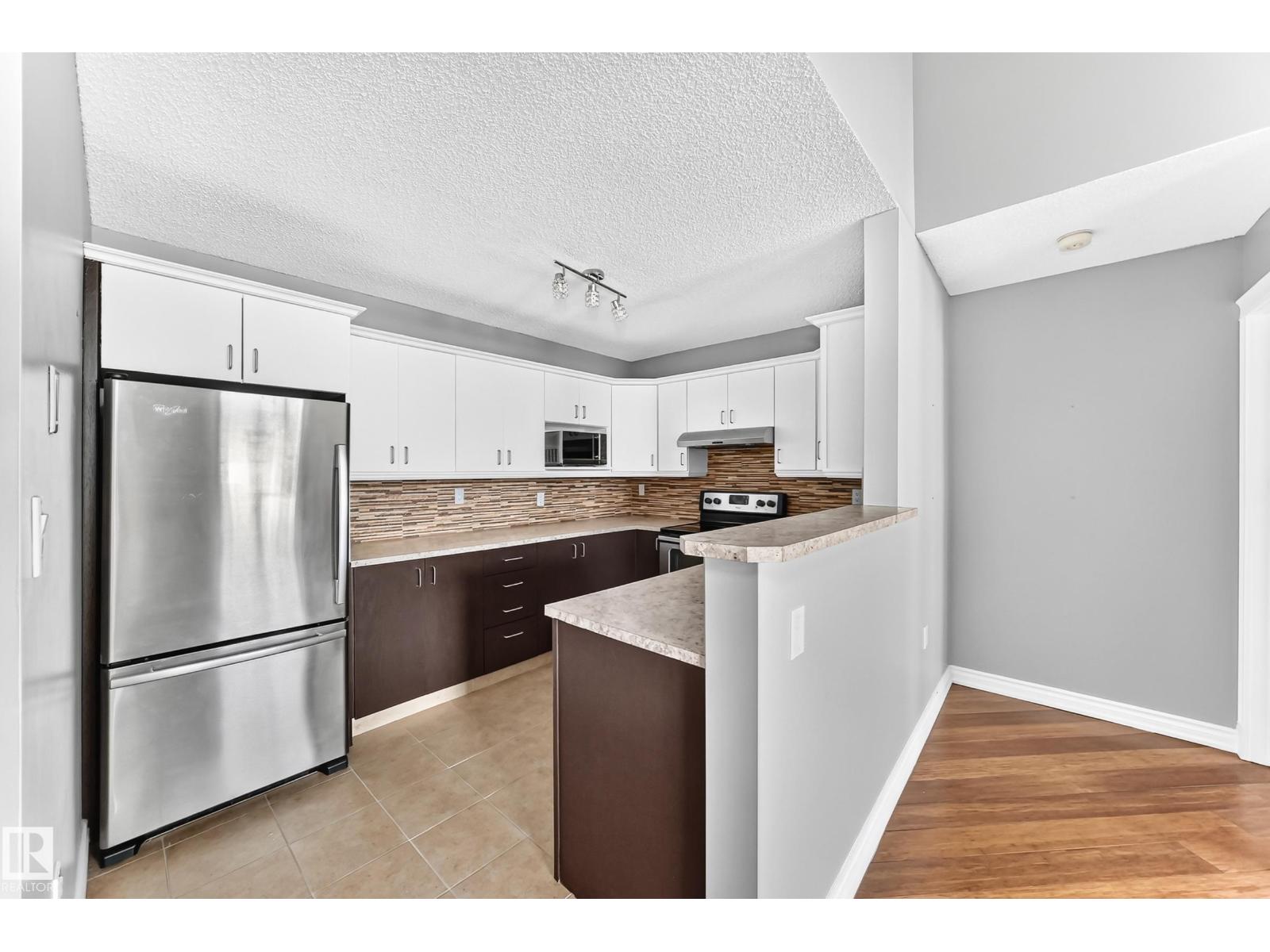 #422 15499 CASTLE DOWNS RD NW - 16