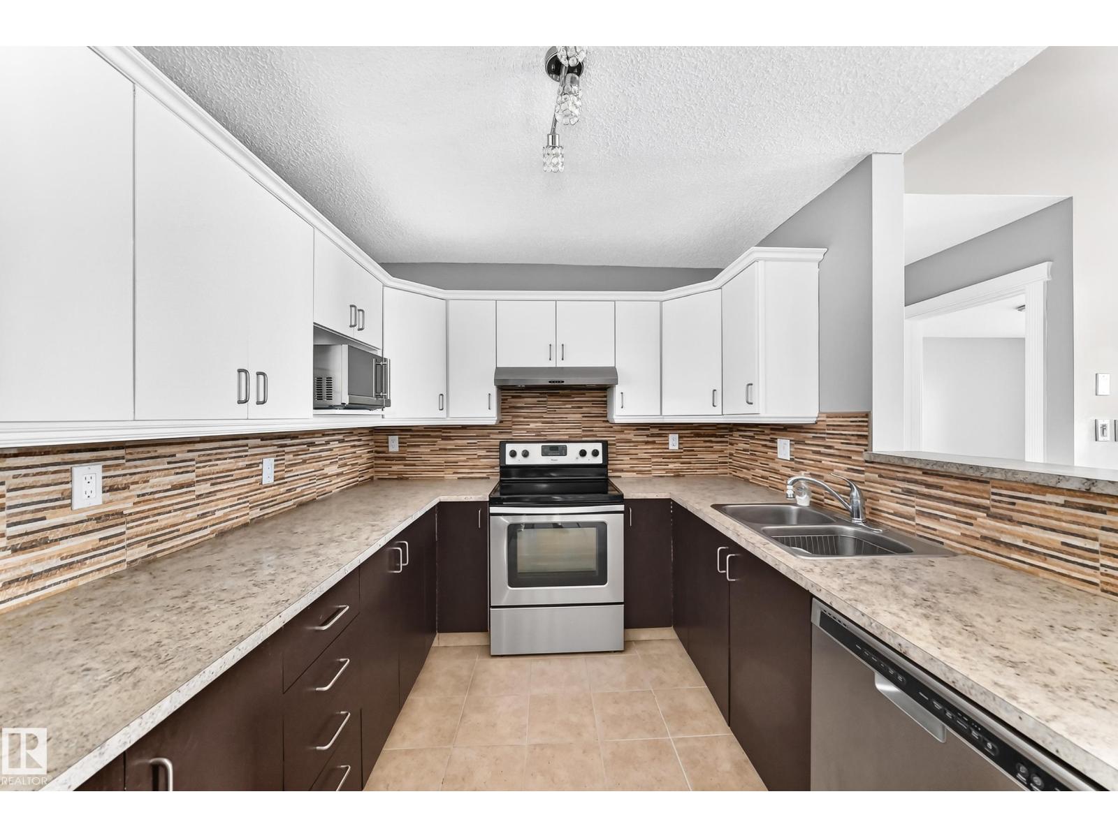 #422 15499 CASTLE DOWNS RD NW - 17