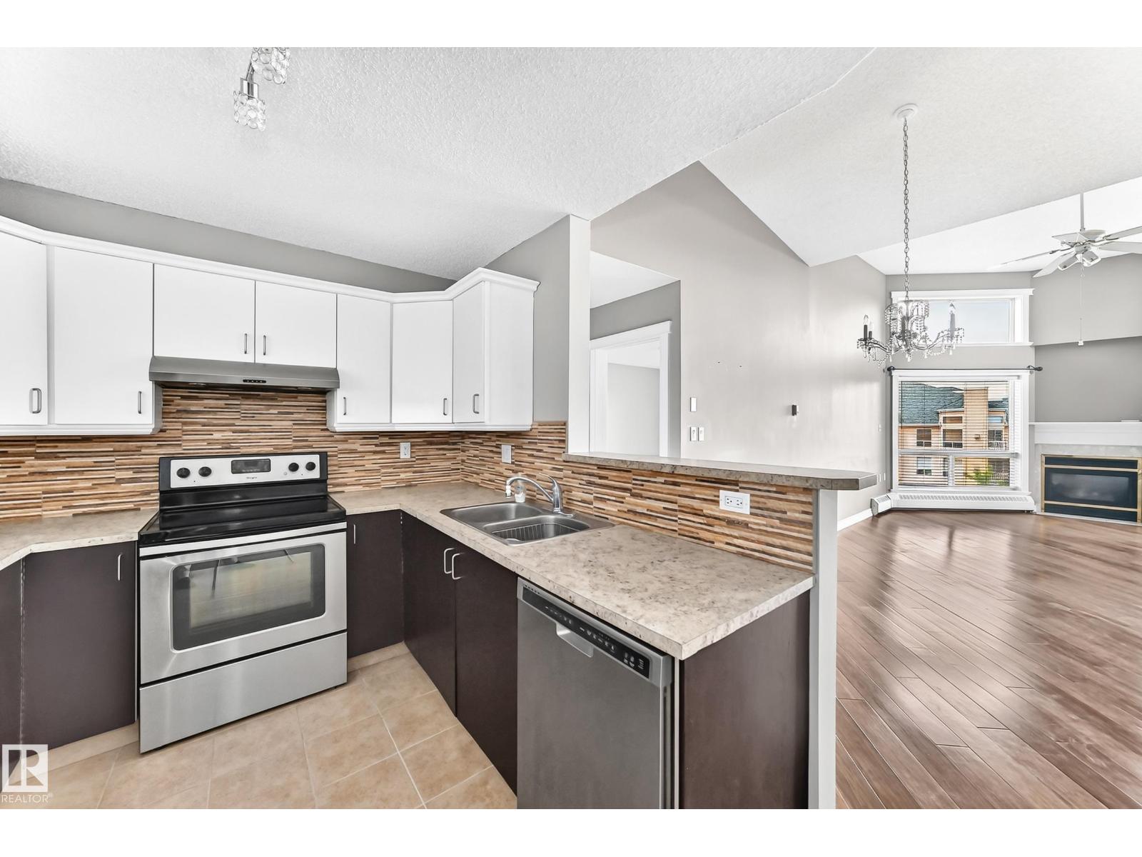 #422 15499 CASTLE DOWNS RD NW - 18