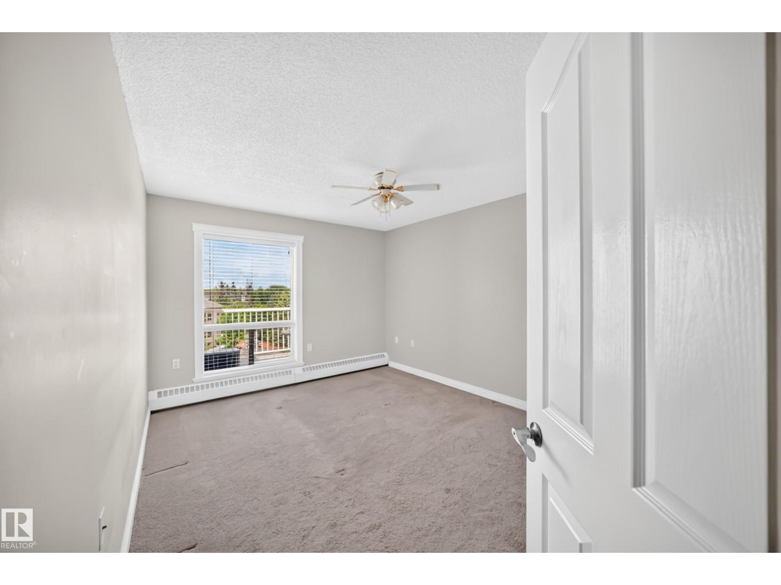 #422 15499 CASTLE DOWNS RD NW - 23