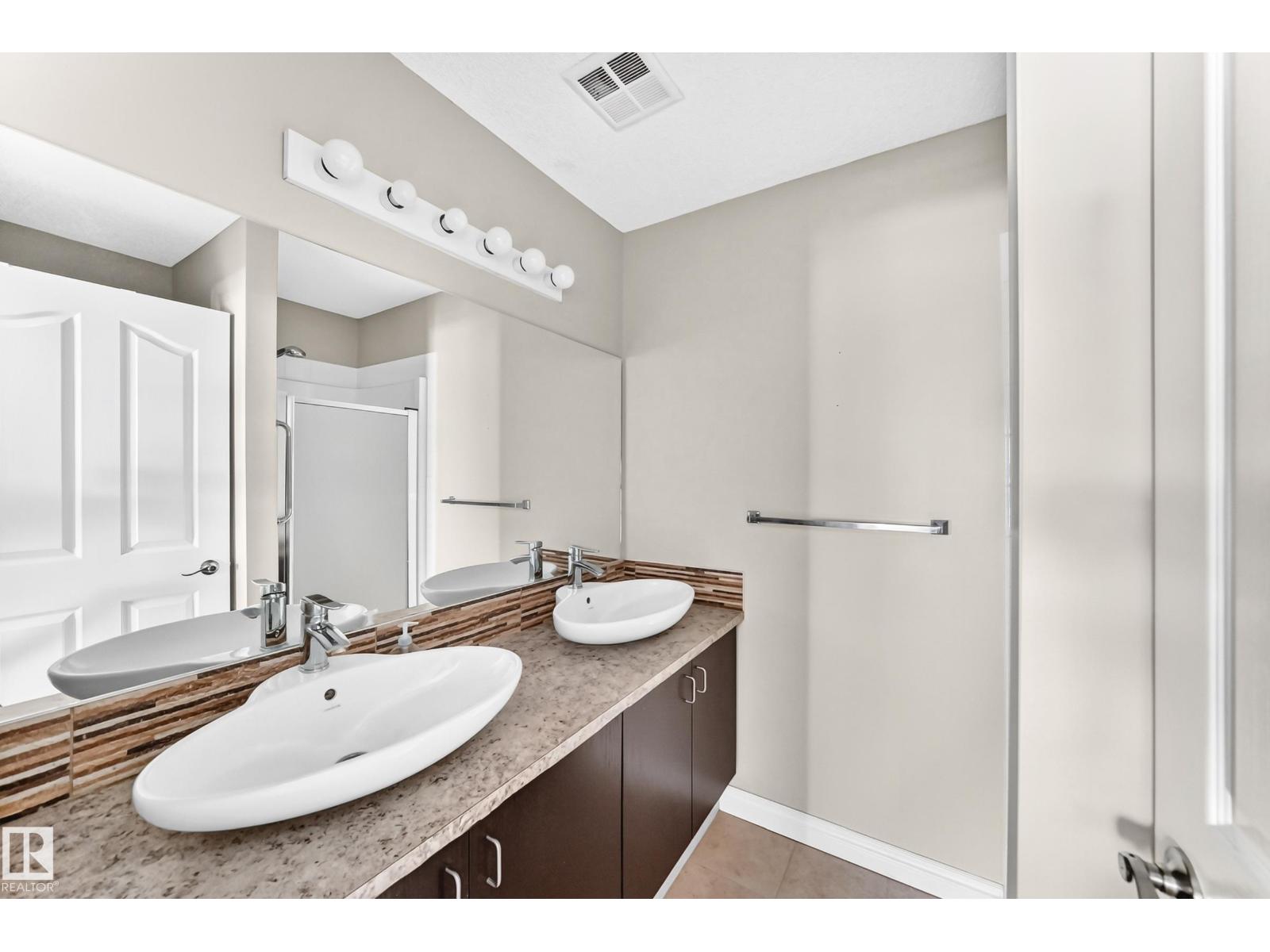 #422 15499 CASTLE DOWNS RD NW - 28