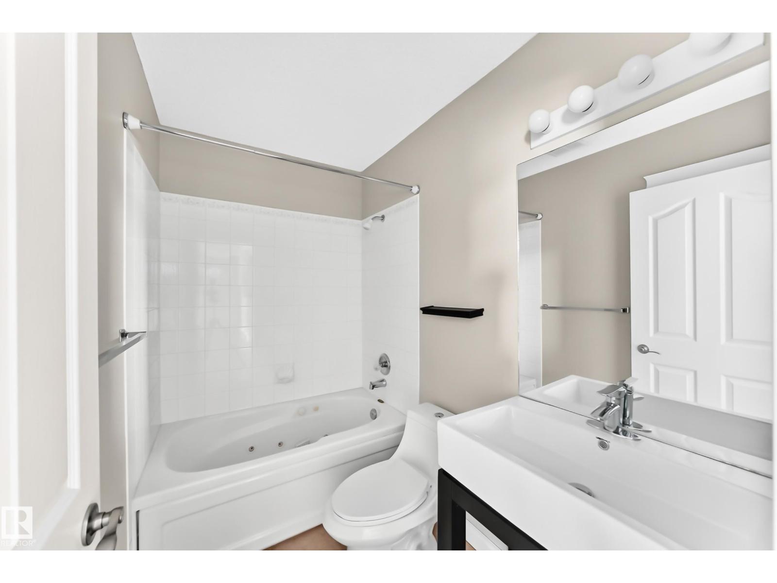 #422 15499 CASTLE DOWNS RD NW - 32