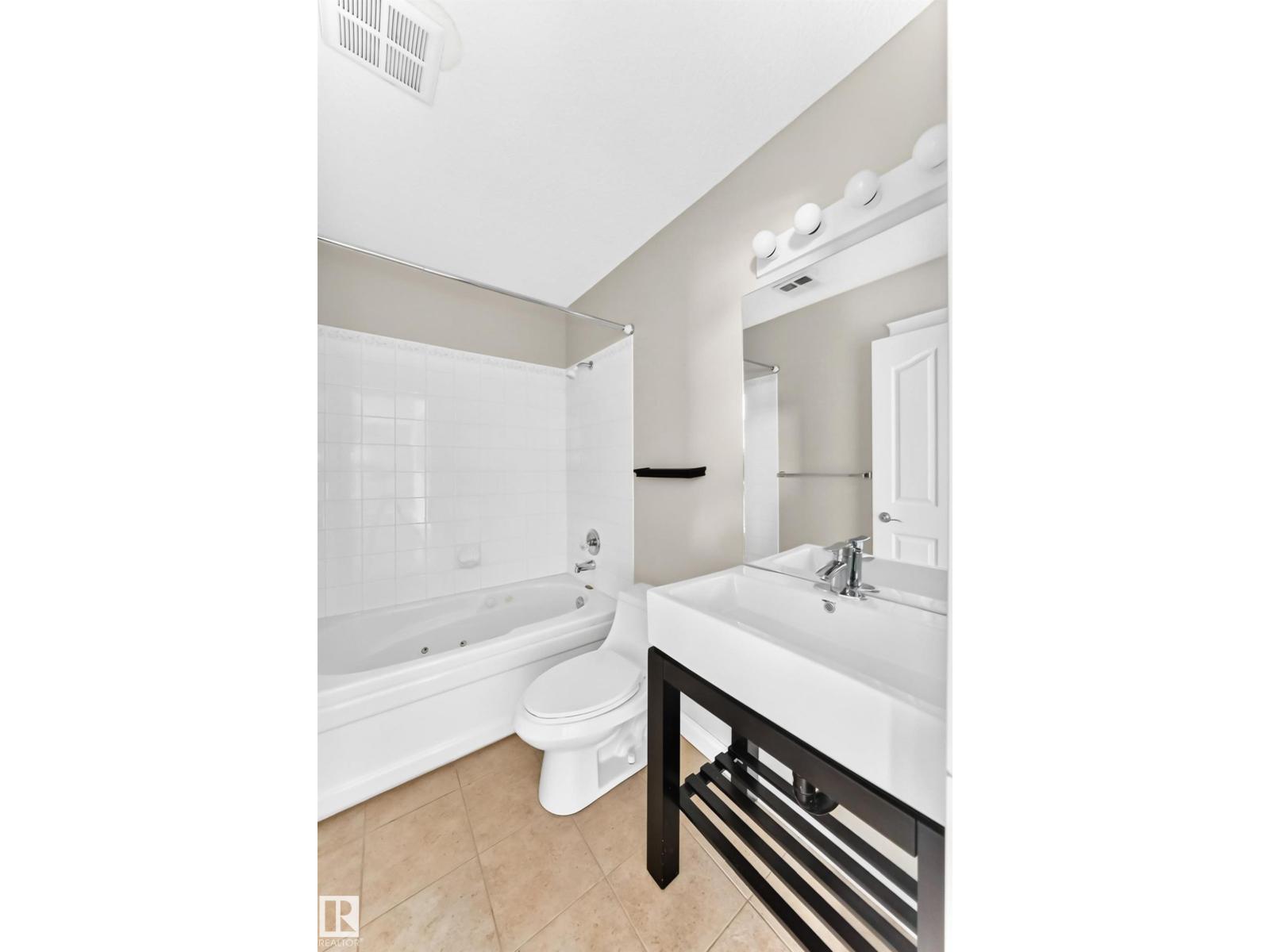 #422 15499 CASTLE DOWNS RD NW - 33