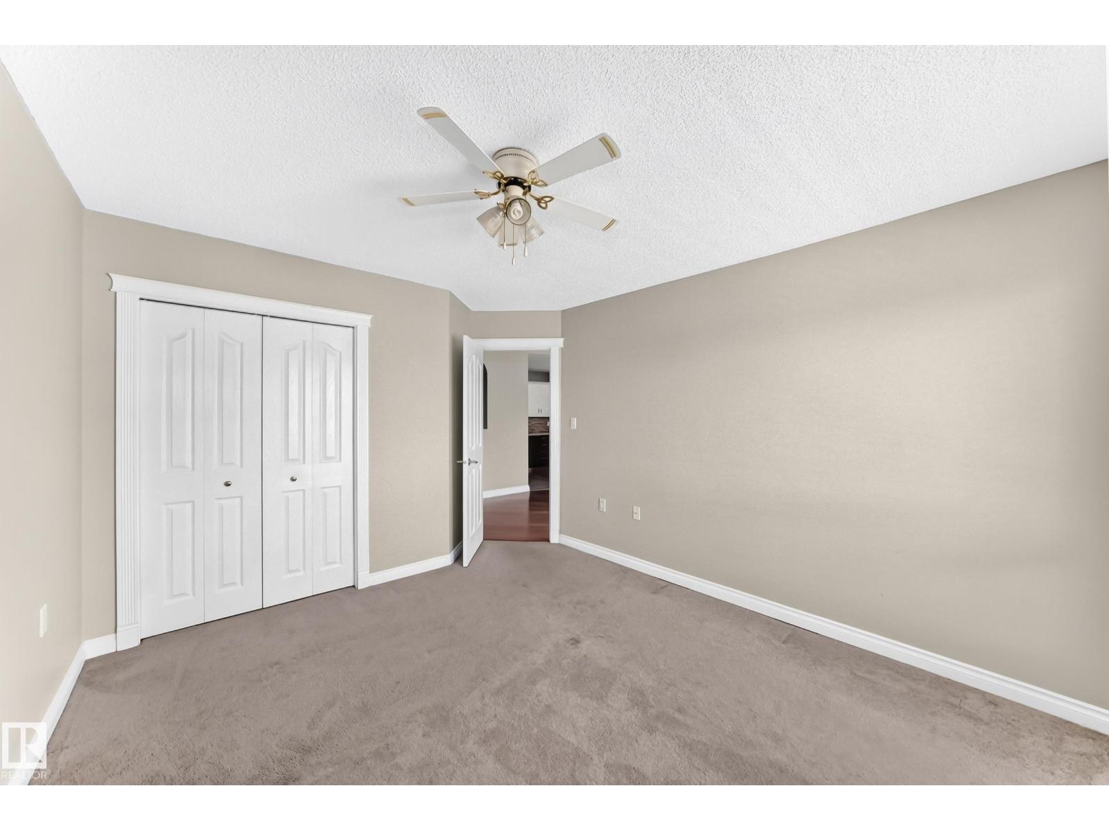 #422 15499 CASTLE DOWNS RD NW - 50