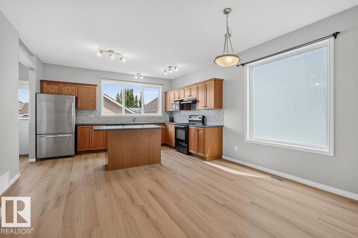 7704 16 AV SW — photo 10