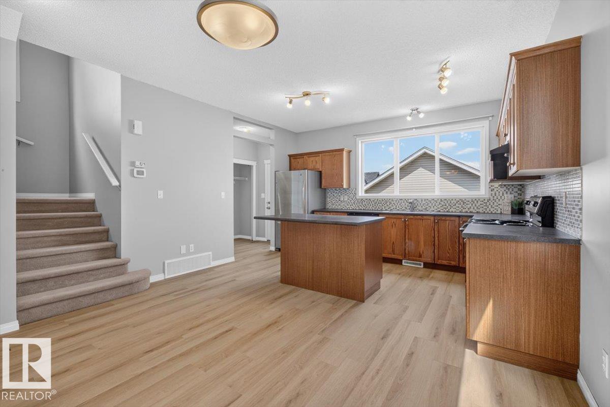 7704 16 AV SW — photo 12