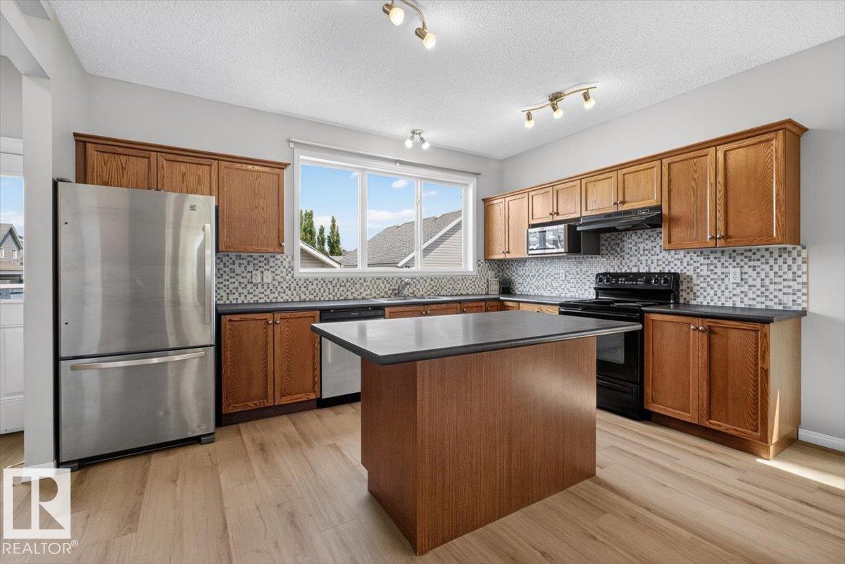 7704 16 AV SW — photo 13