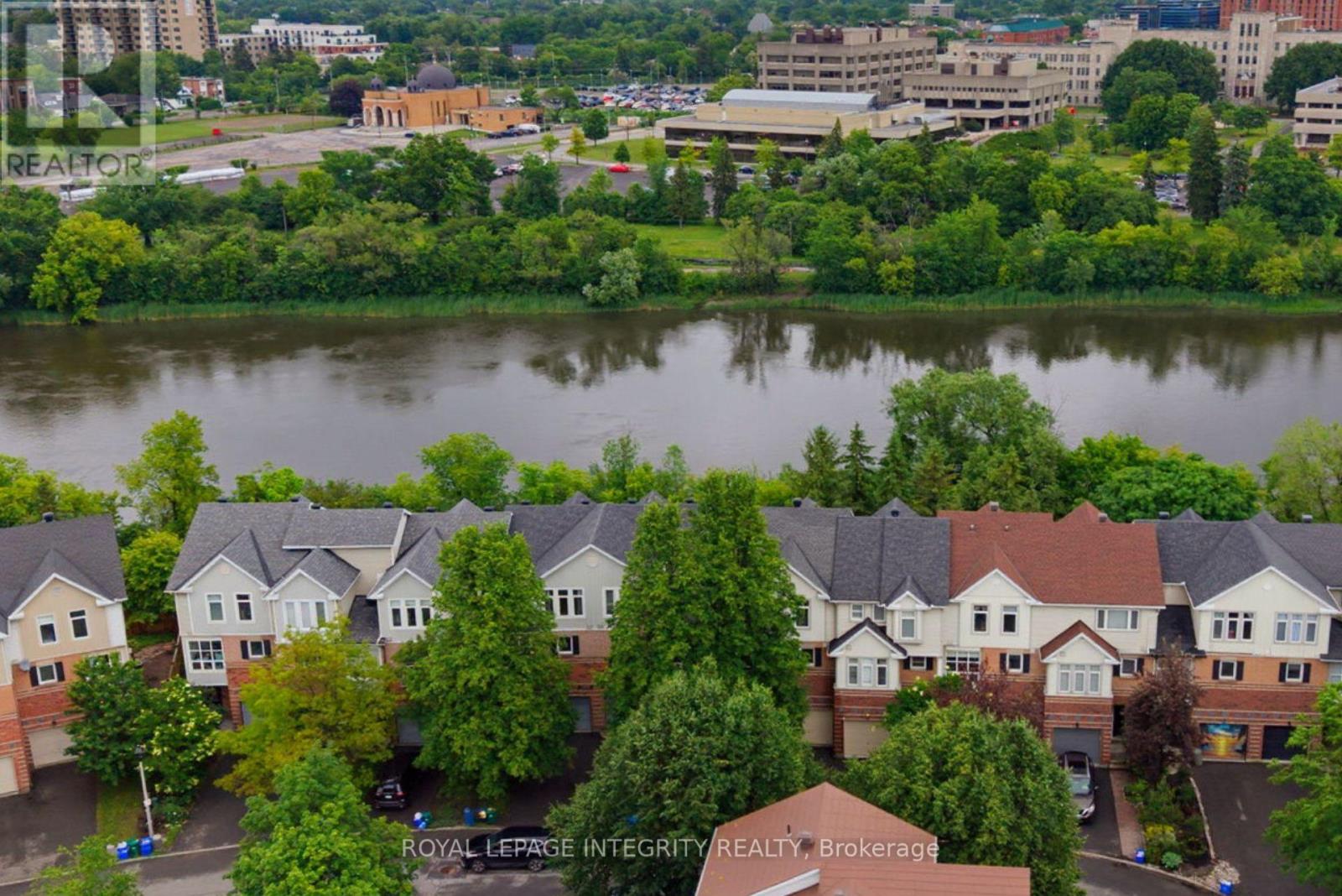 Backing Rideau River & pathway in a unique enclave