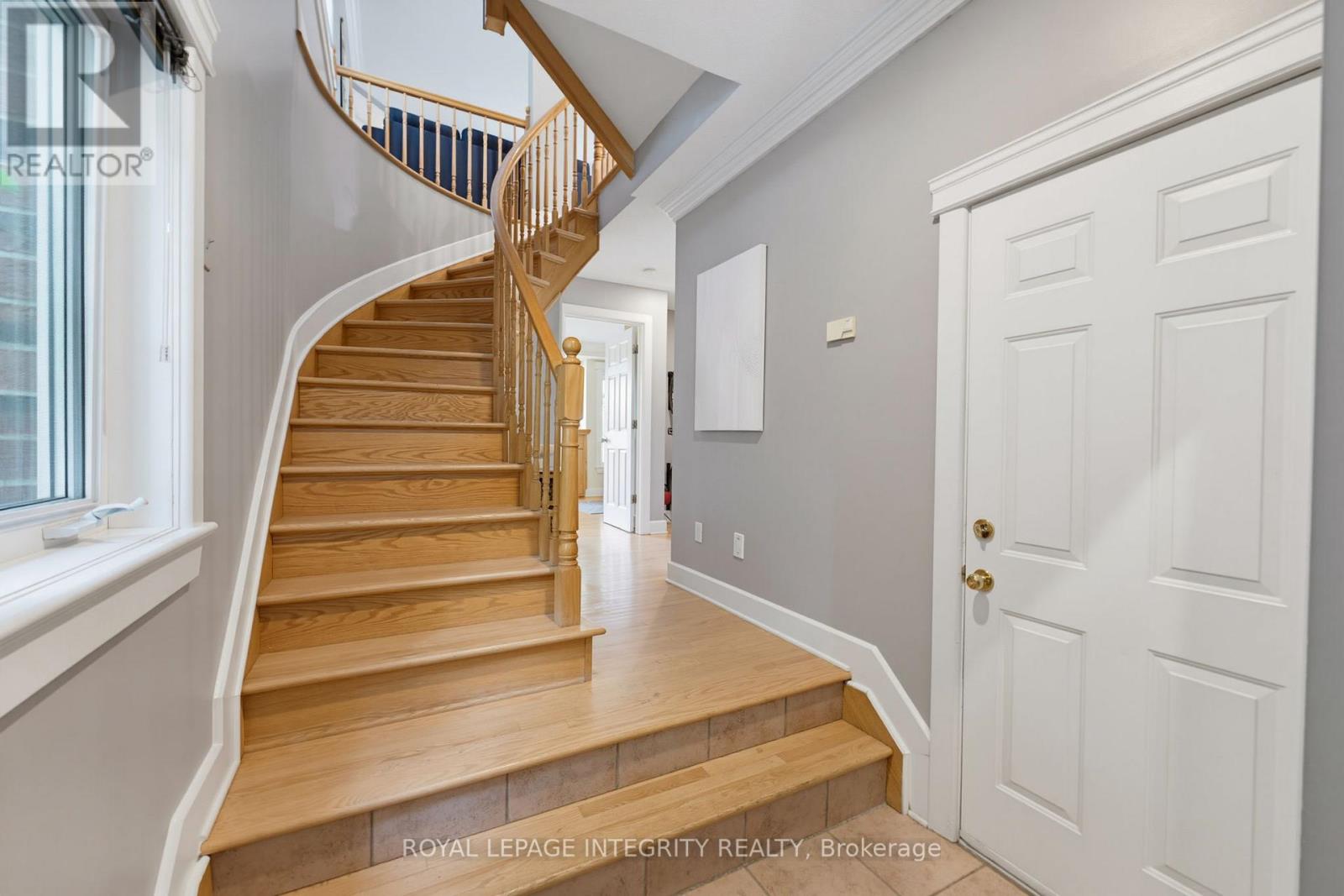 Inside garage access, hardwood staircases
