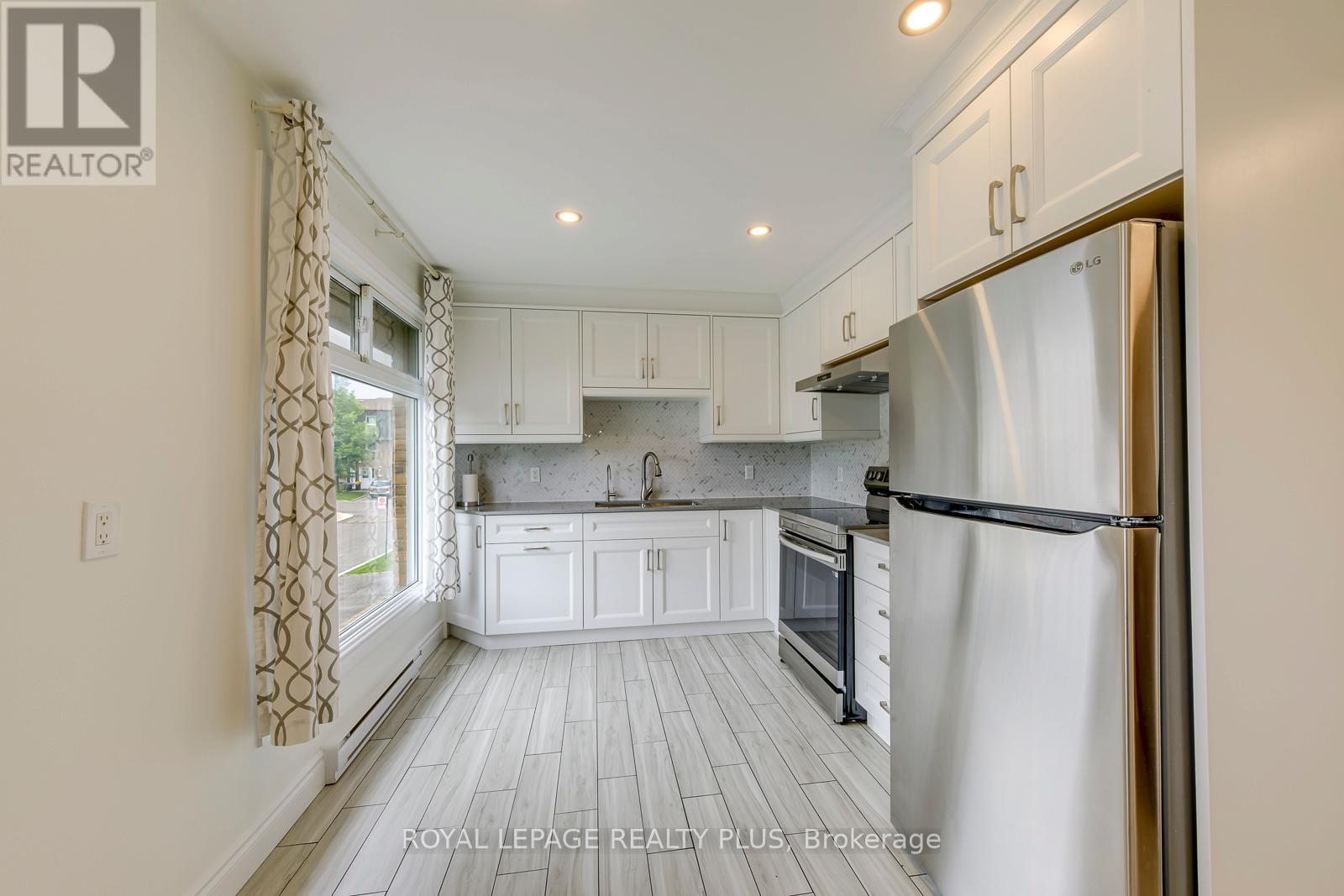 #1 640 RATHBURN ROAD E - 12