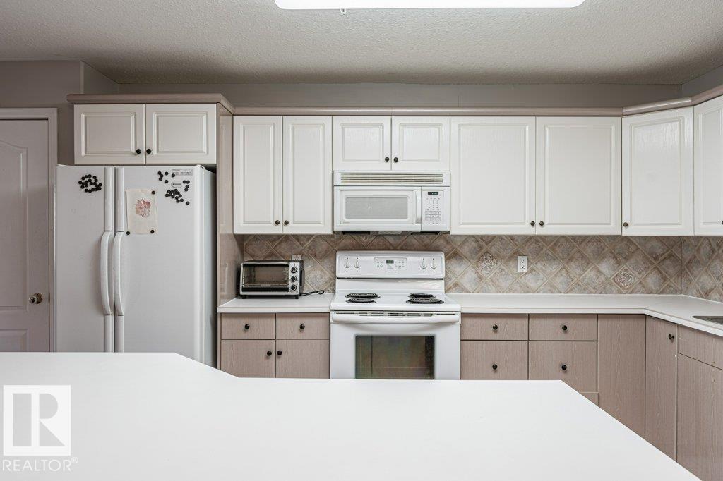 #101 10421 42 AV NW — photo 11